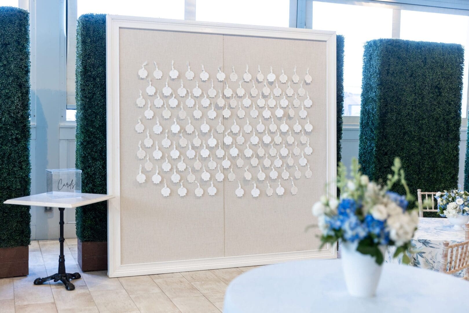 A white board with blue and white flowers on it.